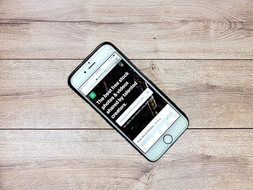 Mobile-friendly website design by NYC web designer on a smartphone screen.