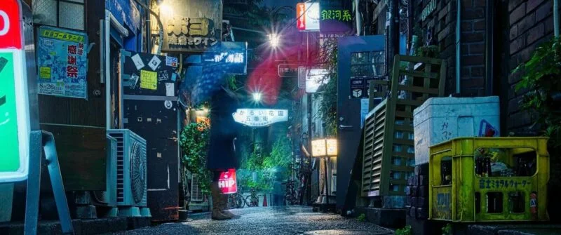 Vibrant NYC alleyway at night, ideal for video editing and web design inspiration.